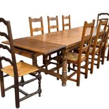 Large farmhouse table made of solid wood.