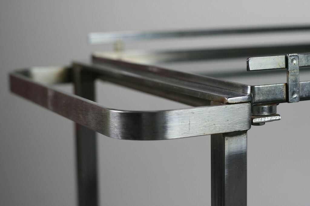 Furniture serves chrome metal and stainless steel 1960s rolling bar