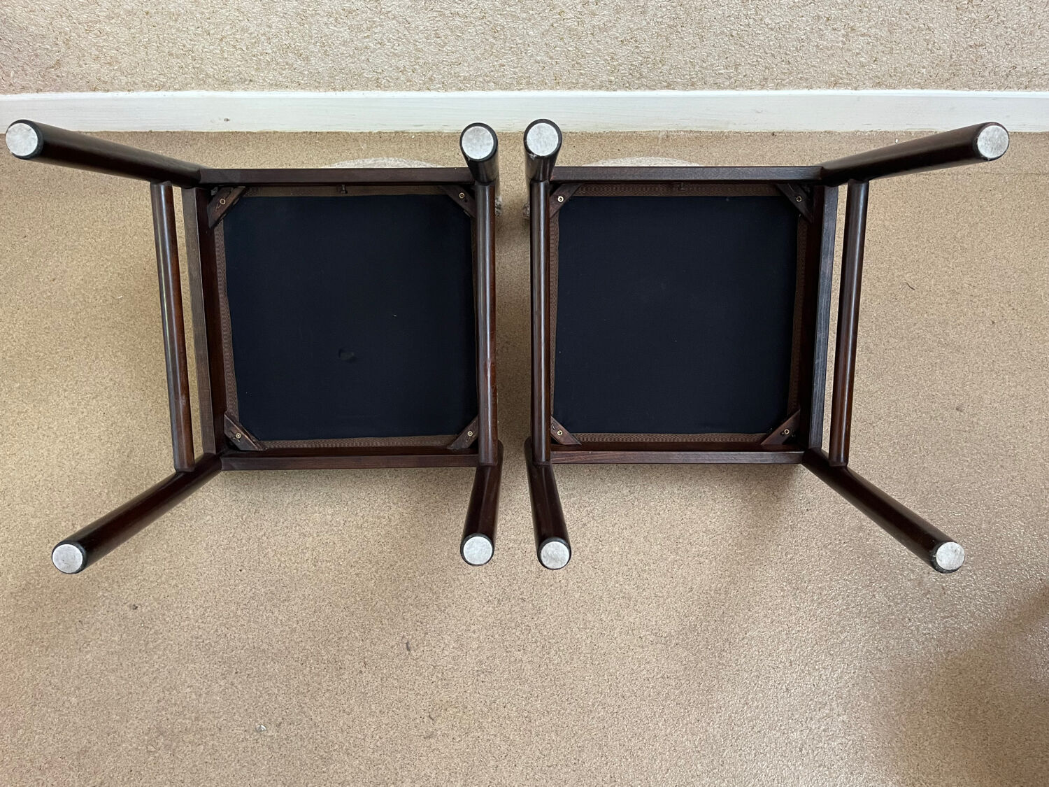 Pair of wooden chairs in loop fabric