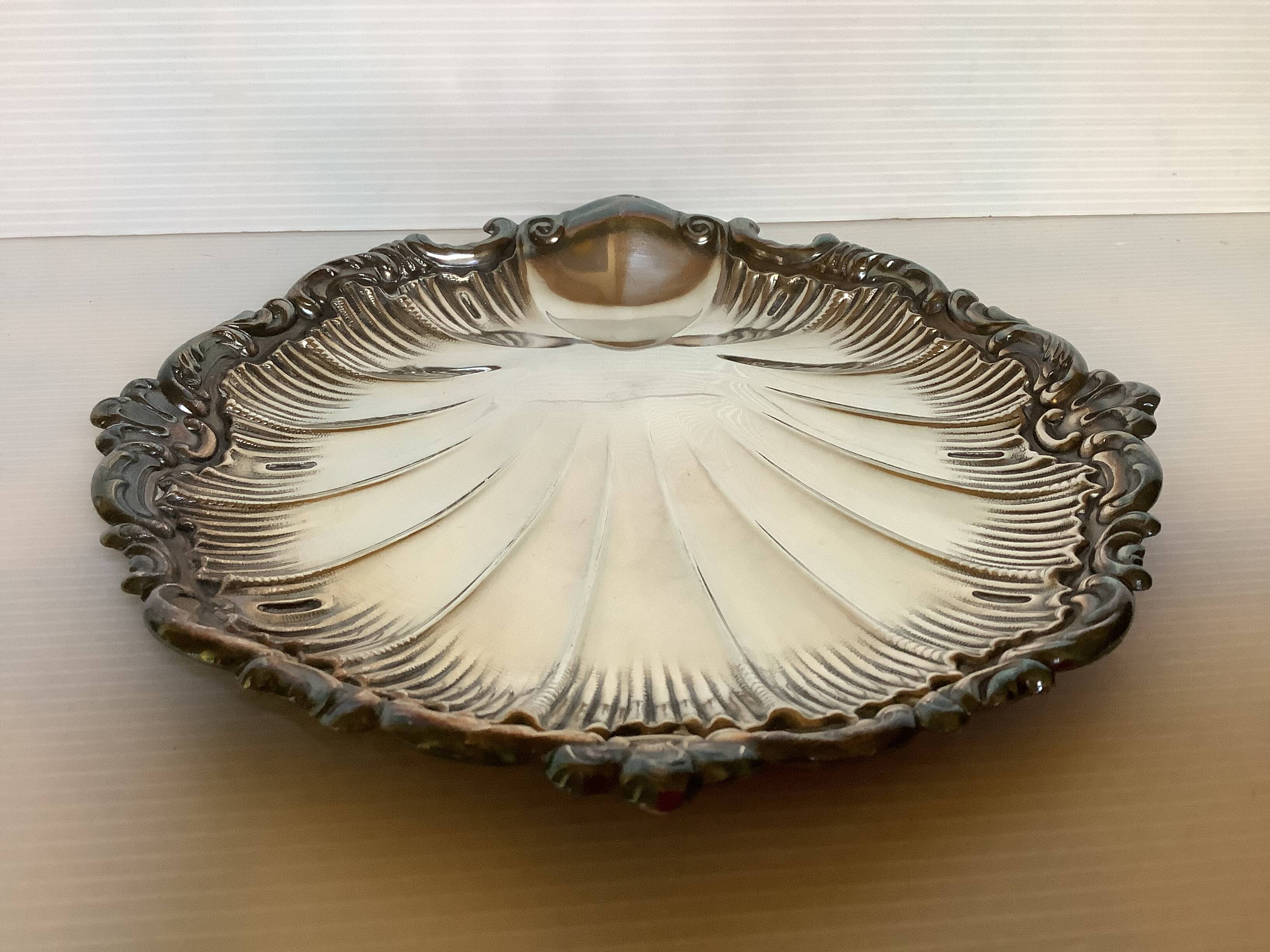 Empty shell pocket Oscar Wiskemann goldsmith