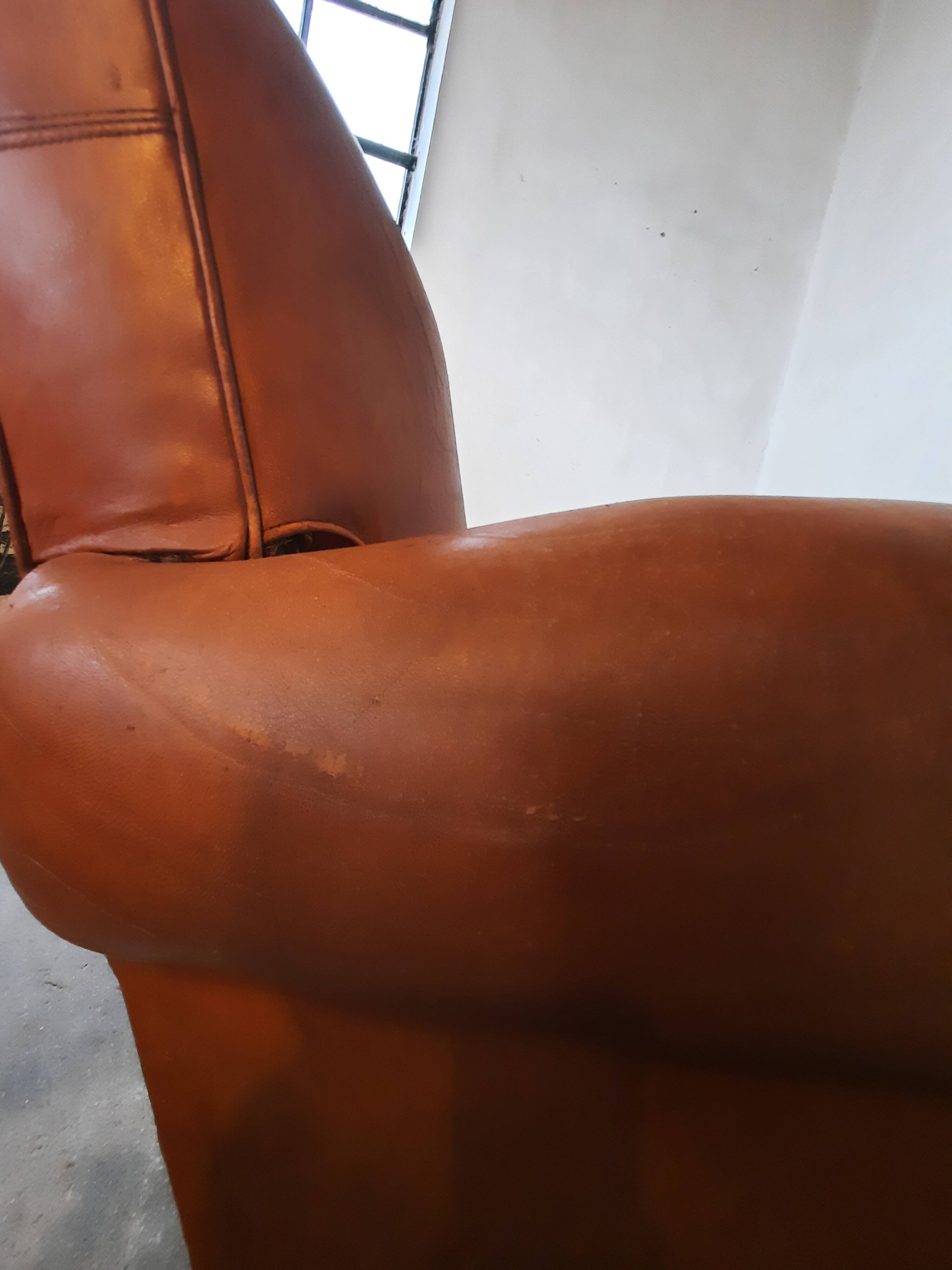 Old leather club chair 1940-1950