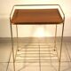 Side table - wooden and gold metal magazine rack