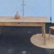 Large antique farmhouse table with 2 drawers in raw solid wood.