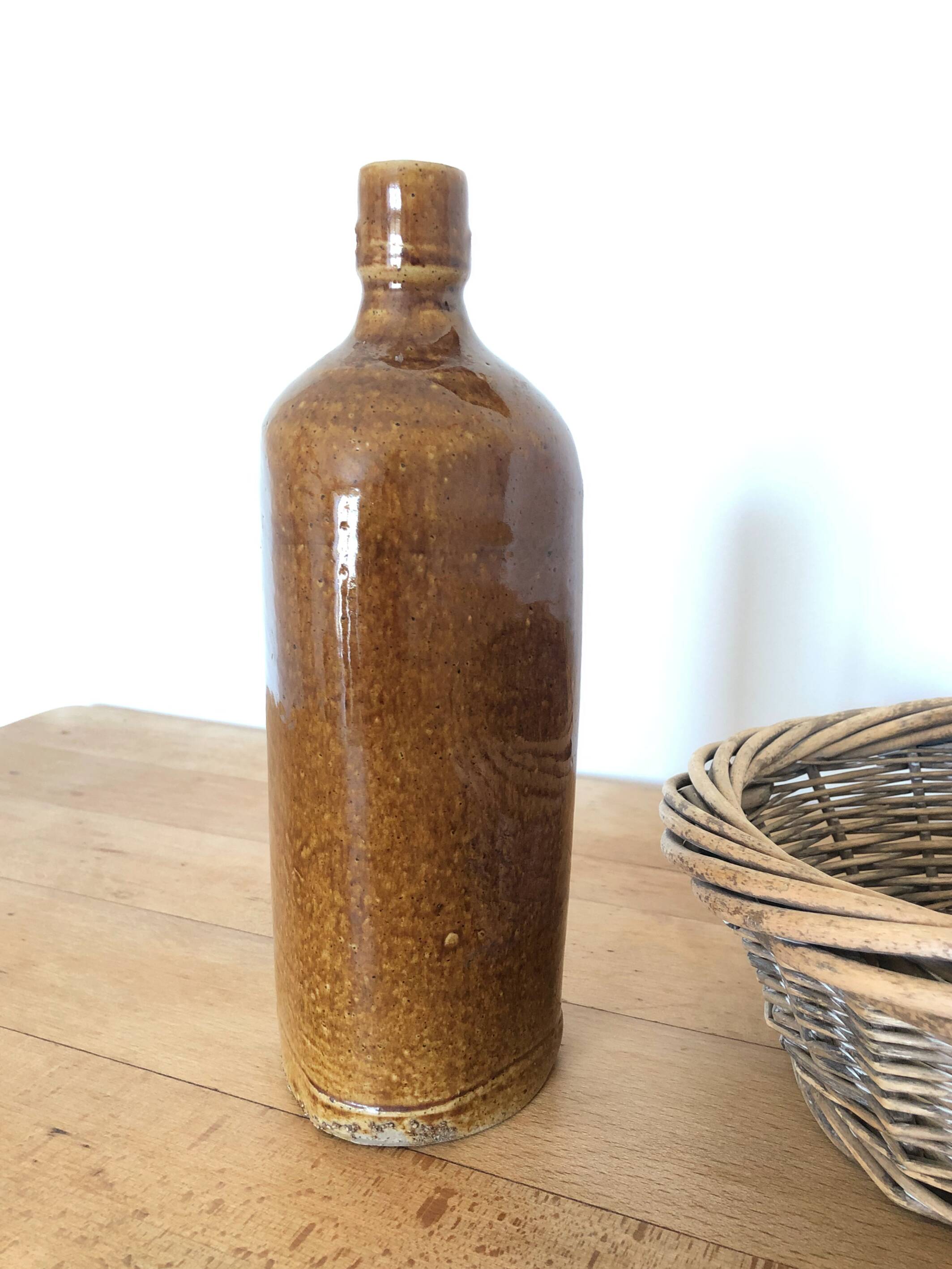 Set of 5 antique glazed stoneware bottles