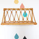 Rattan wall shelf