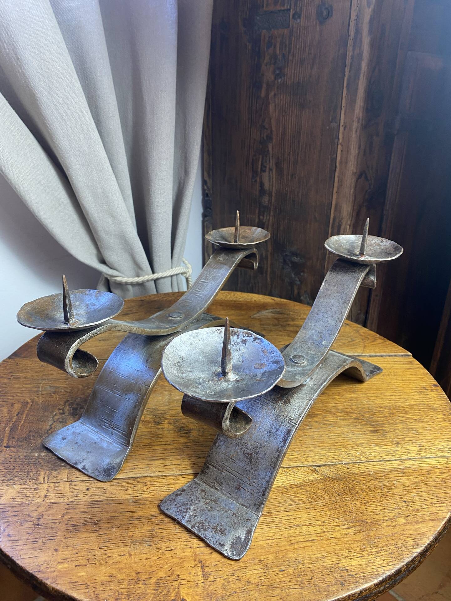 Brutalist wrought iron candlestick pair