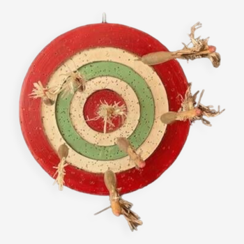 Old target and wooden darts from the 1900s
