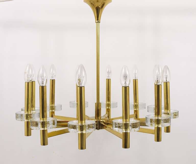 Brass and glass disc pendant light in the style of Gaetano Sciolari, mid-century, Italy, 1970s.