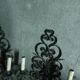 Two large wrought iron wall lights