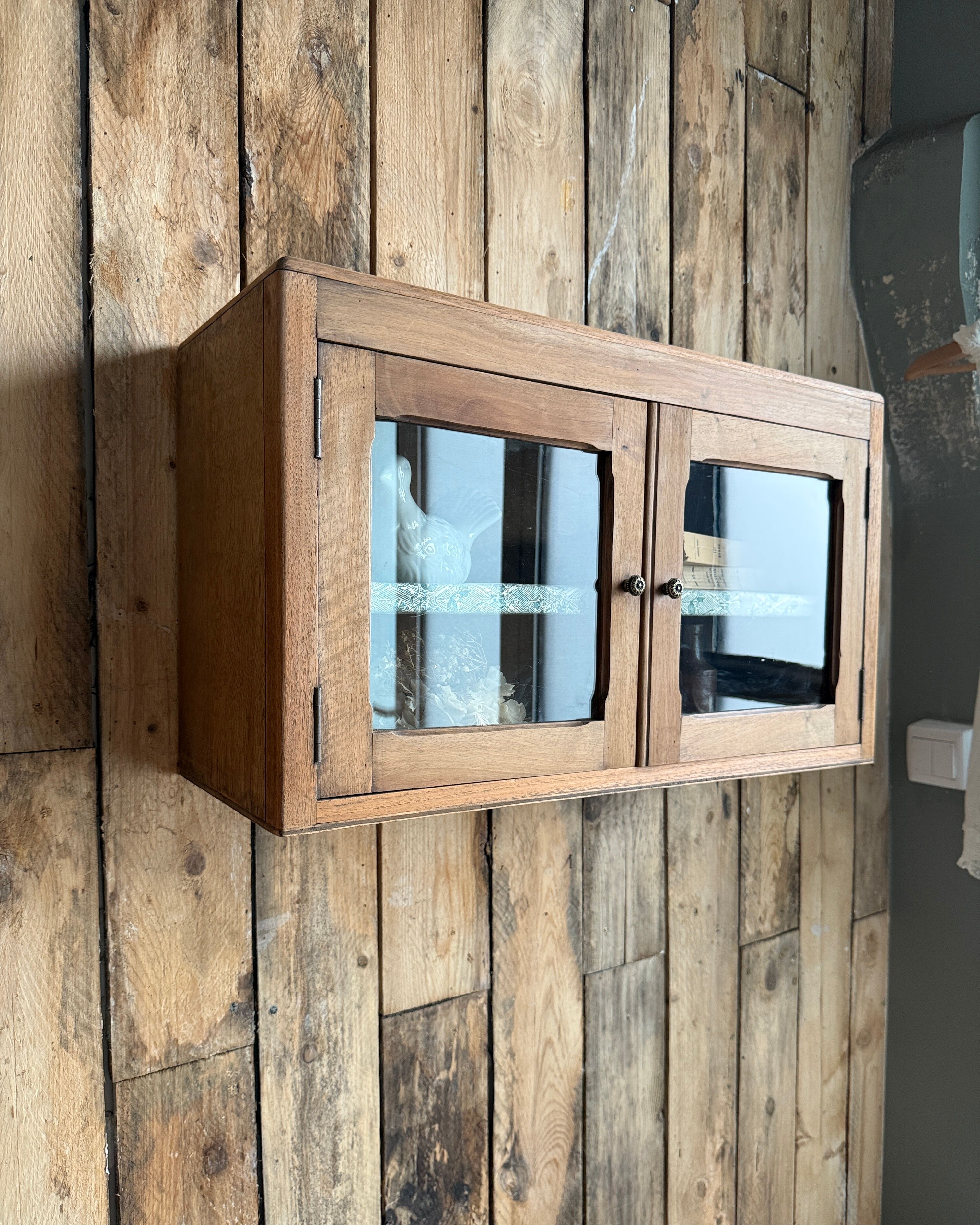 Small antique wall display cabinet in walnut.