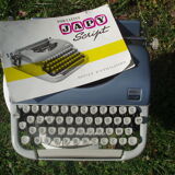 Typewriter blue japy script  with manual and carrying case