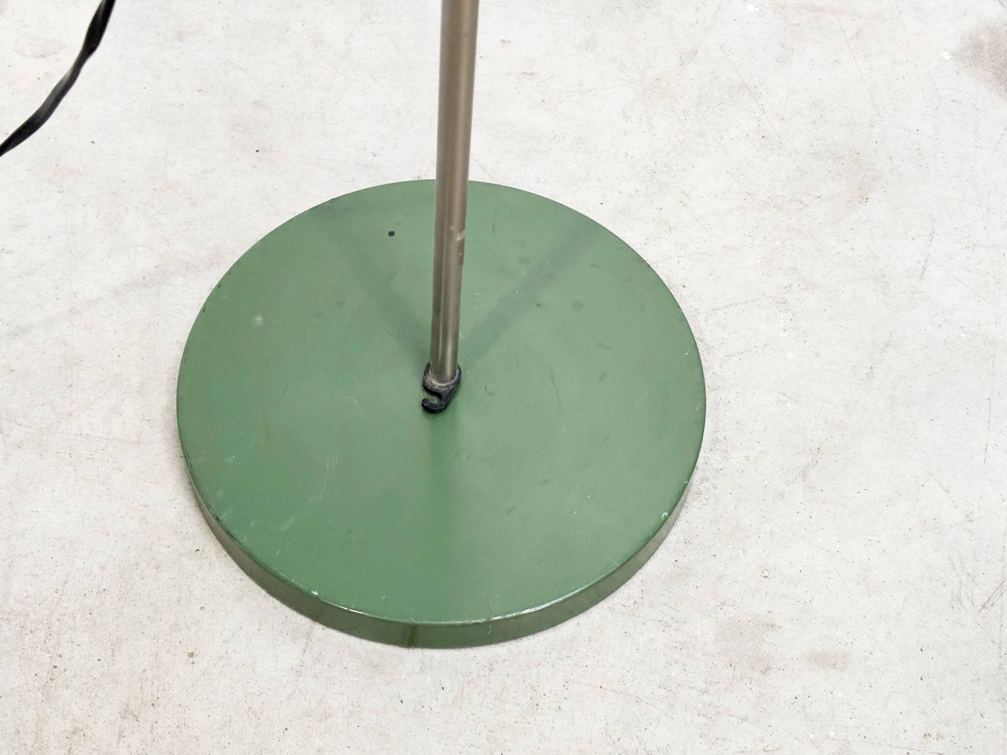 Green floor lamp by HKA Helsingin Kaasuvalo