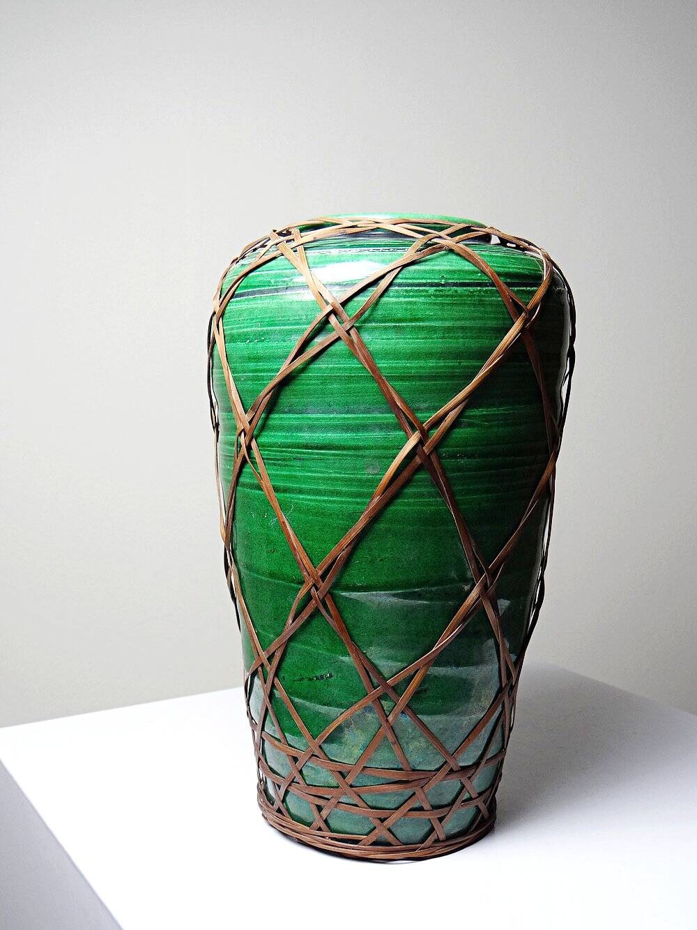 Antique Japanese green ceramic vase with Awaji Yaki bamboo lacing, 1900-1930
