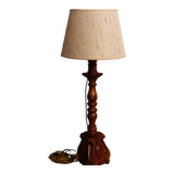 Carved wooden lamp, fiber shade