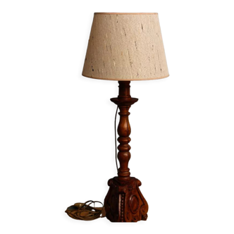 Carved wooden lamp, fiber shade