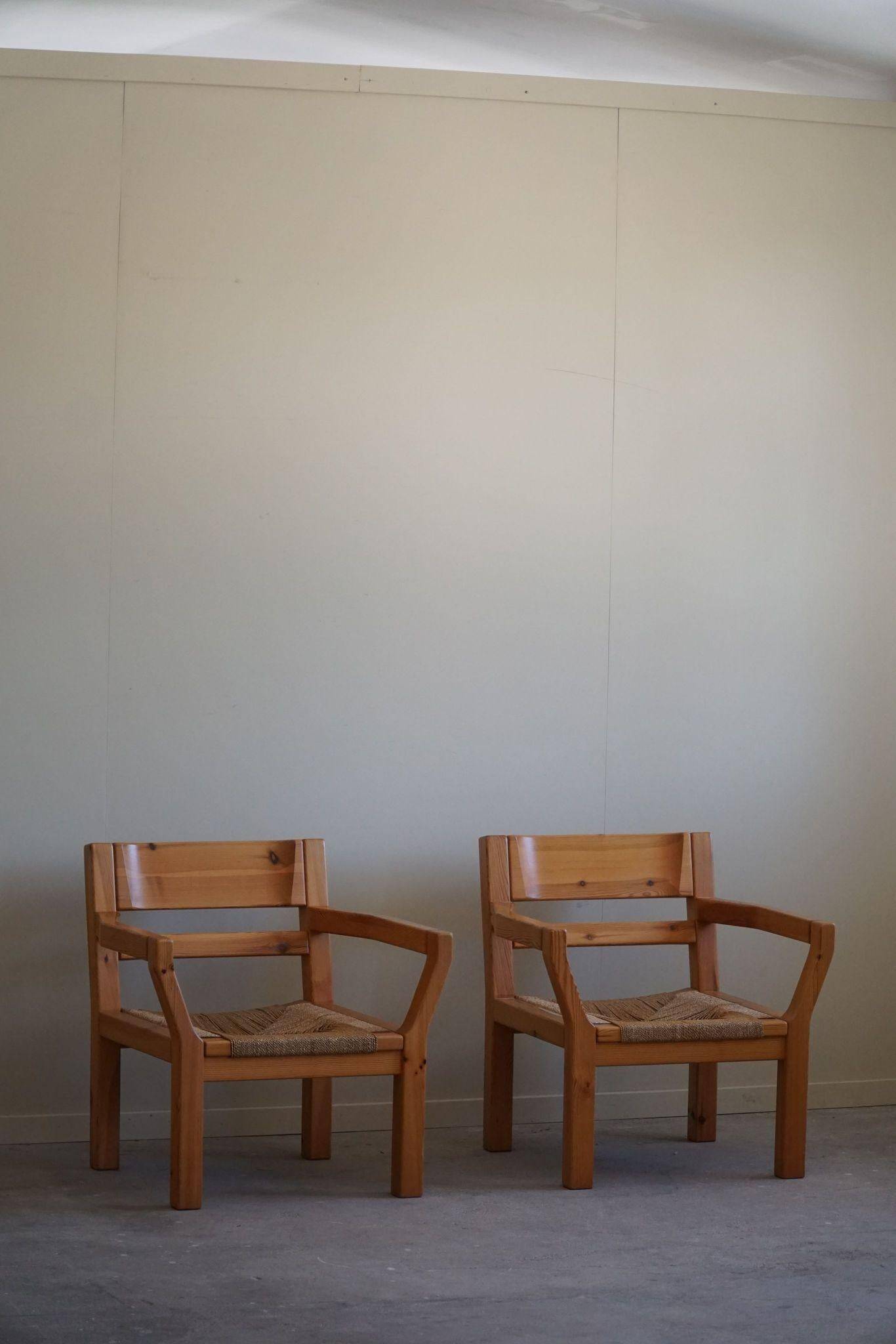 Tage Poulsen, a pair of brutalist chairs in pine and cord, Danish modern style, 1970s.