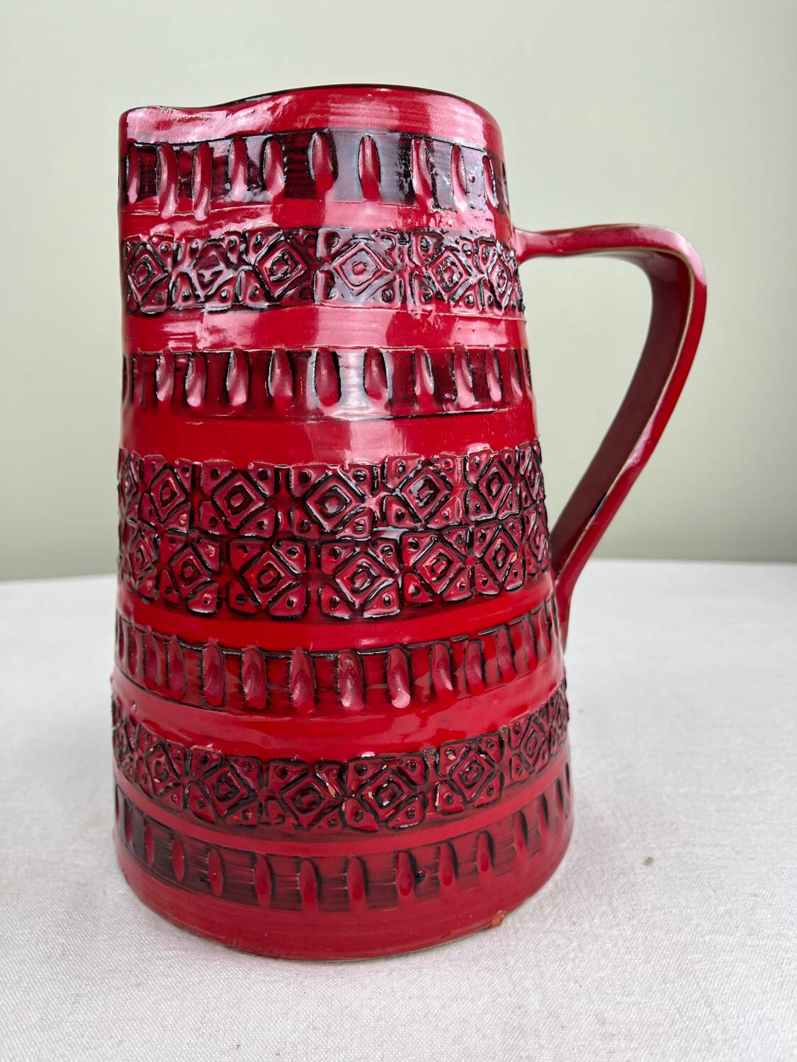 Vintage red ceramic jug