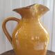 Large vintage enamelled terracotta pitcher