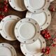 Set of 10 vintage white and gold dessert plates.