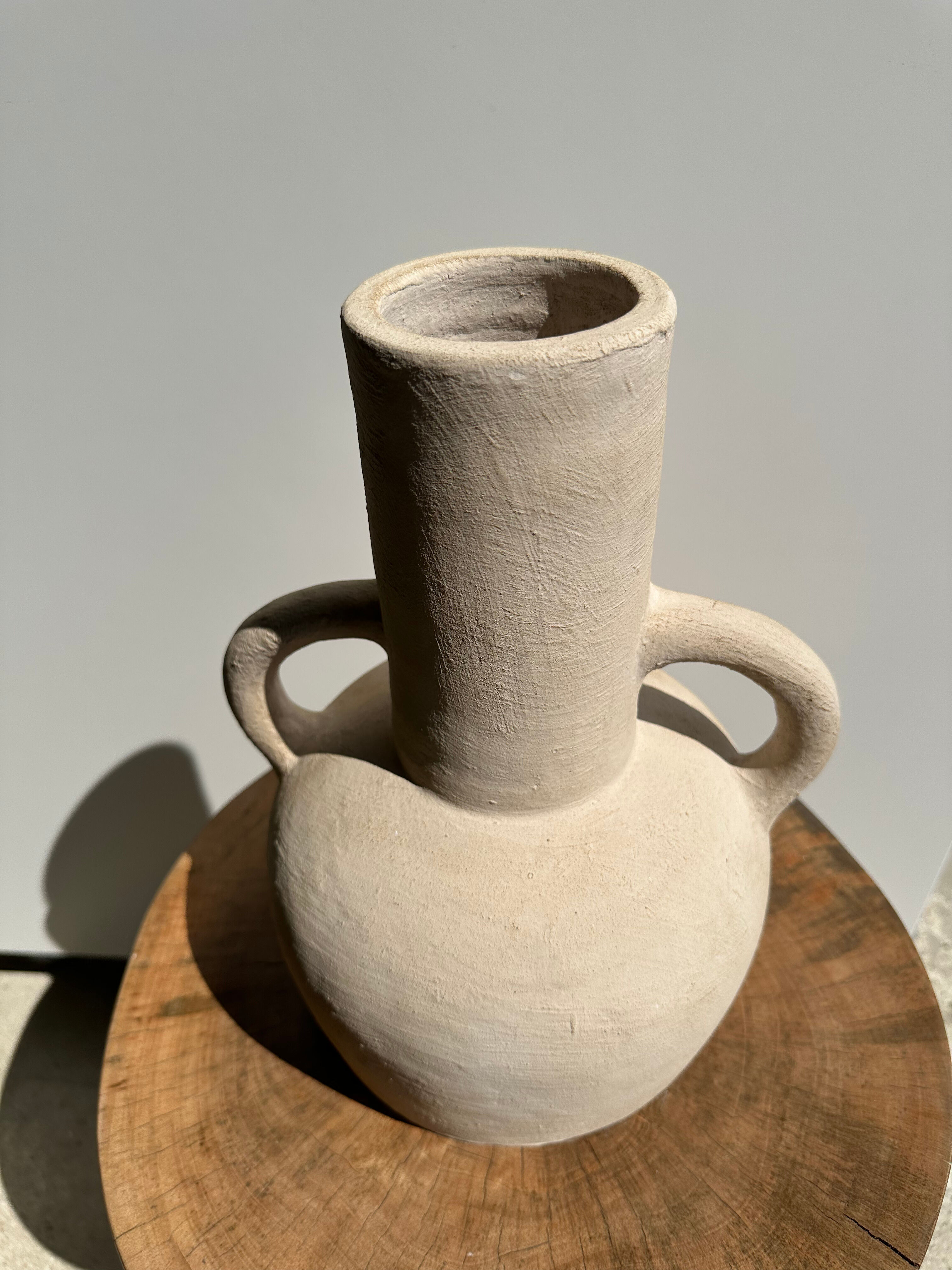 Handmade terracotta vase painted in beige with double handles h:32 d:25
