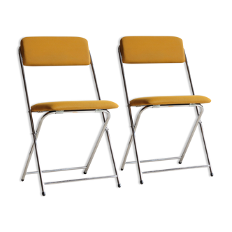 Pair of Eyrel 70s folding chairs in chrome metal and mustard fabric