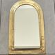 Miroir contour laiton doré