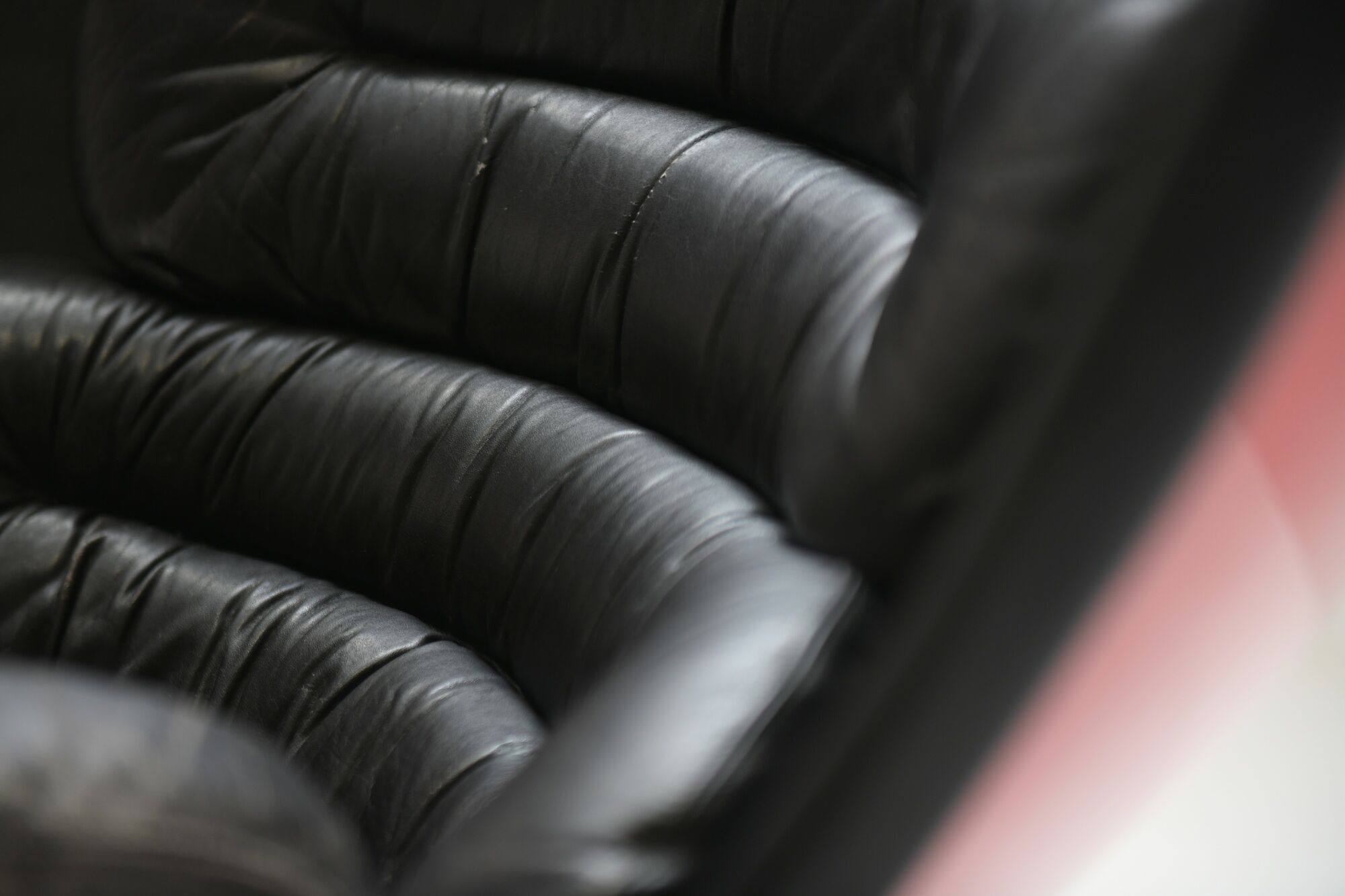 Vintage Elda chair in black leather & red shell by Joe Colombo for Comfort Italy