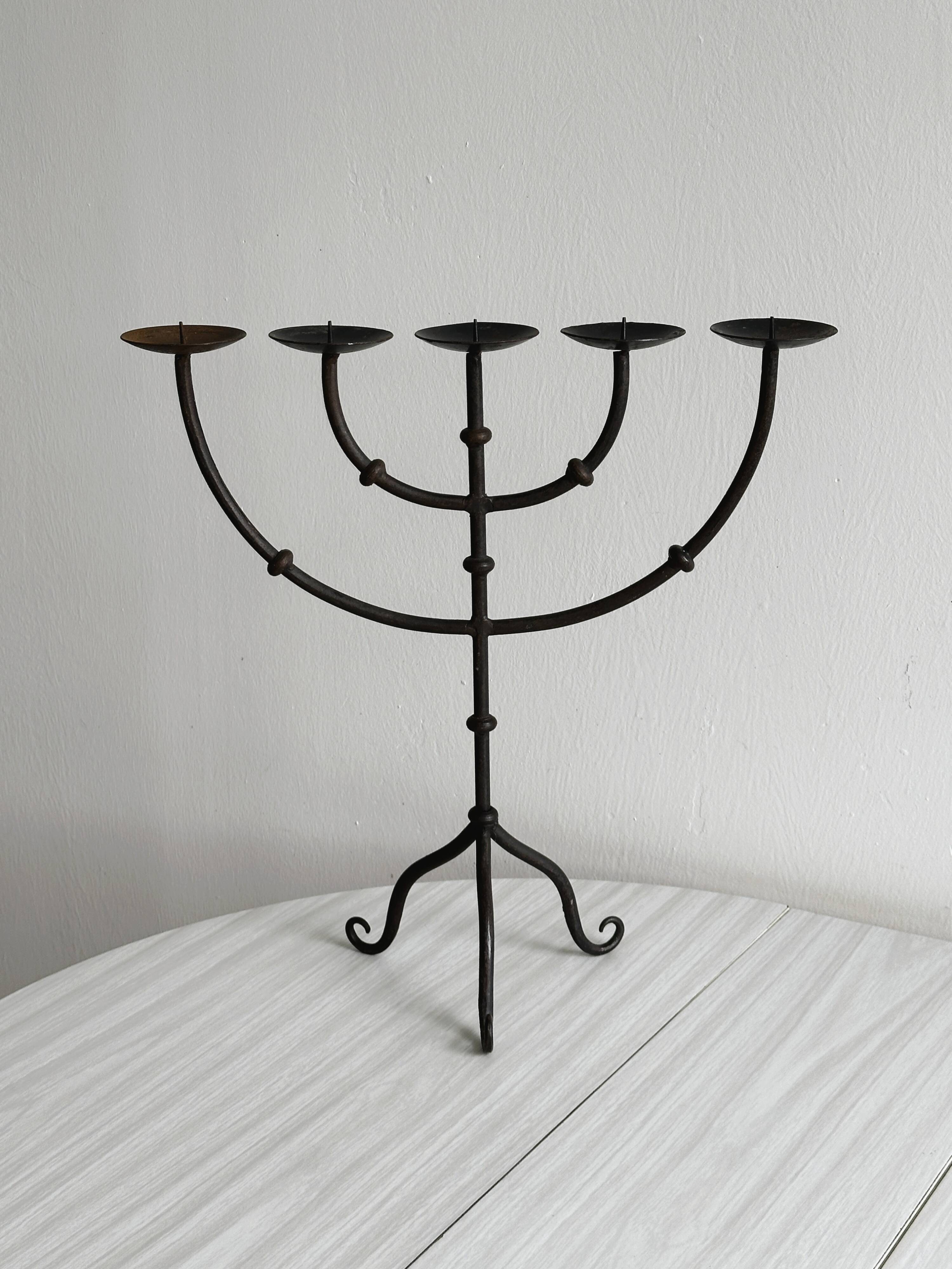 5-arm black metal candlestick