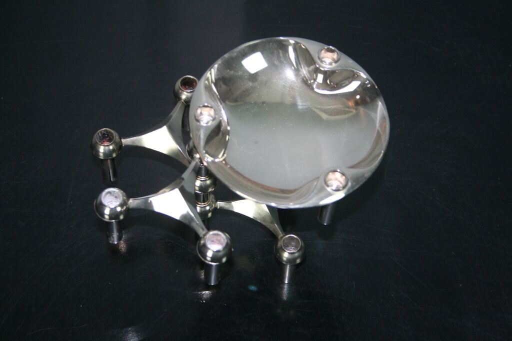 3 candle holders and 1 modular cup NAGEL 1970