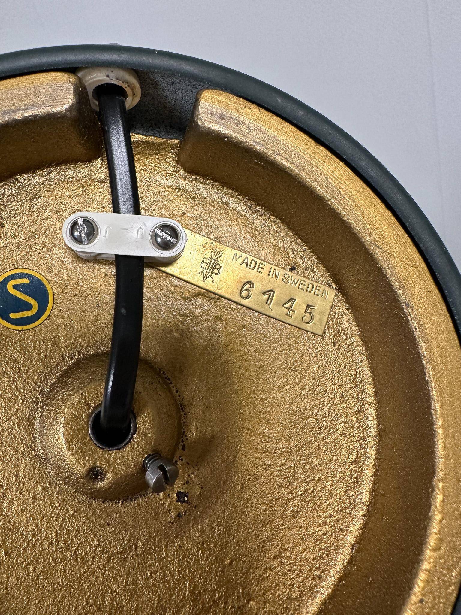 Mid-century teak and cotton table lamp by Einar Bäckström, Sweden, 1950s.