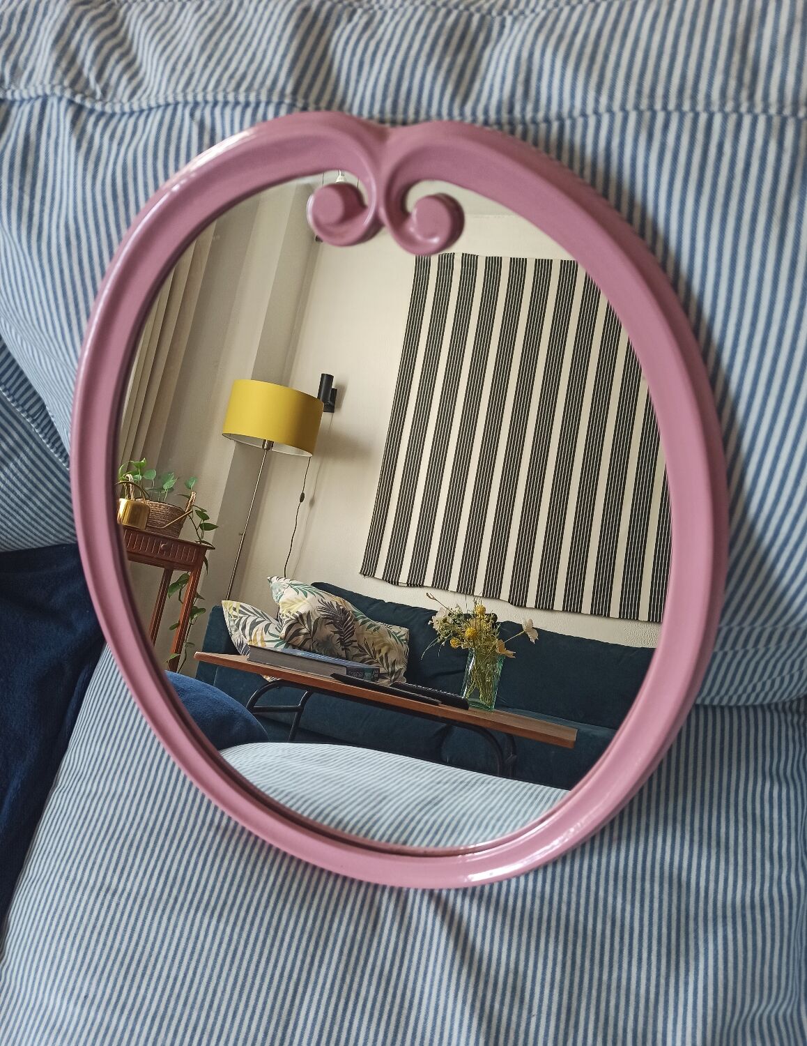 Vintage pink oval cast iron mirror