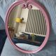 Vintage pink oval cast iron mirror