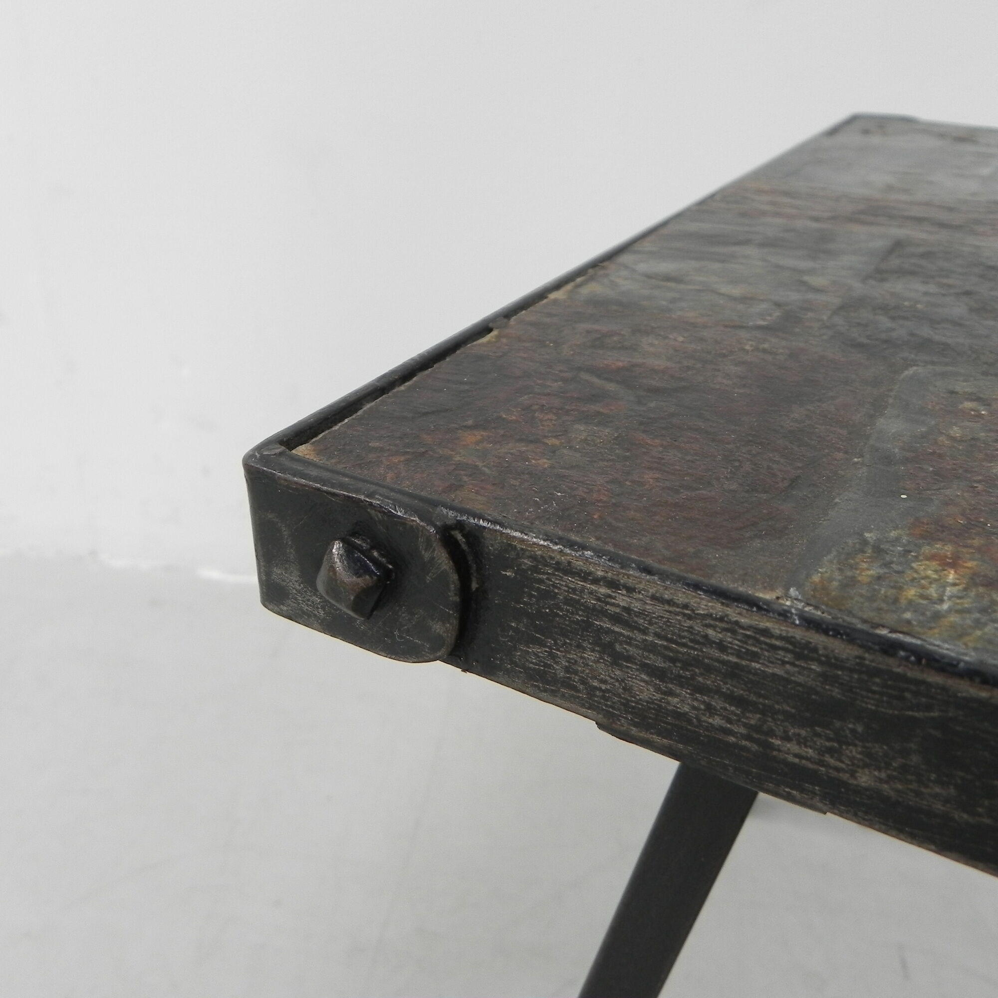 Brutalist coffee table with slate top
