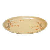 Plat ovale vintage en porcelaine par la Maison Revol, France