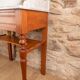 Antique washbasin cabinet in solid pitch pine with a white marble top.