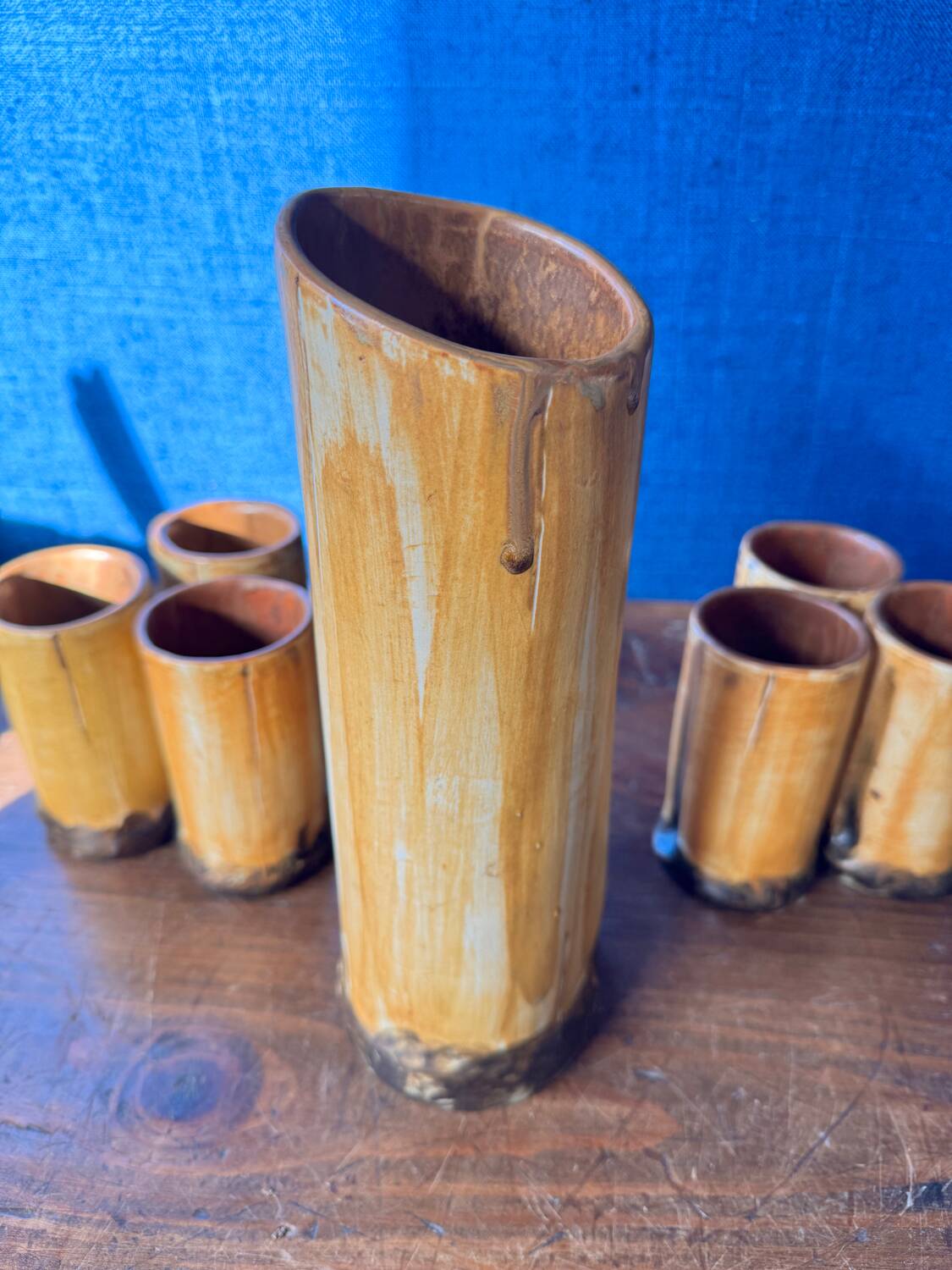 Vintage 1970s ceramic pitcher and glass set for orangeade, faux bamboo.
