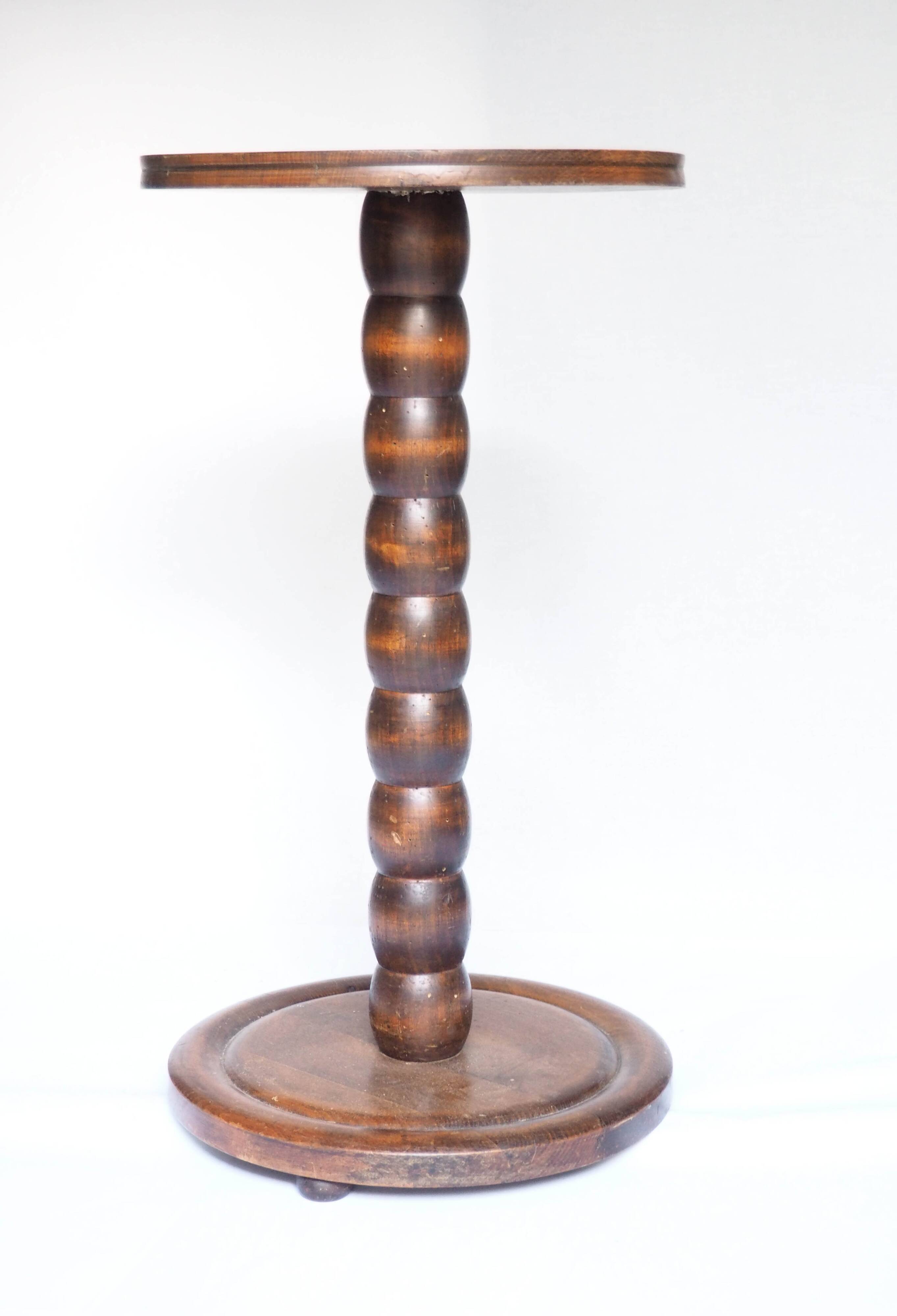 Stele, wooden beaded pedestal table