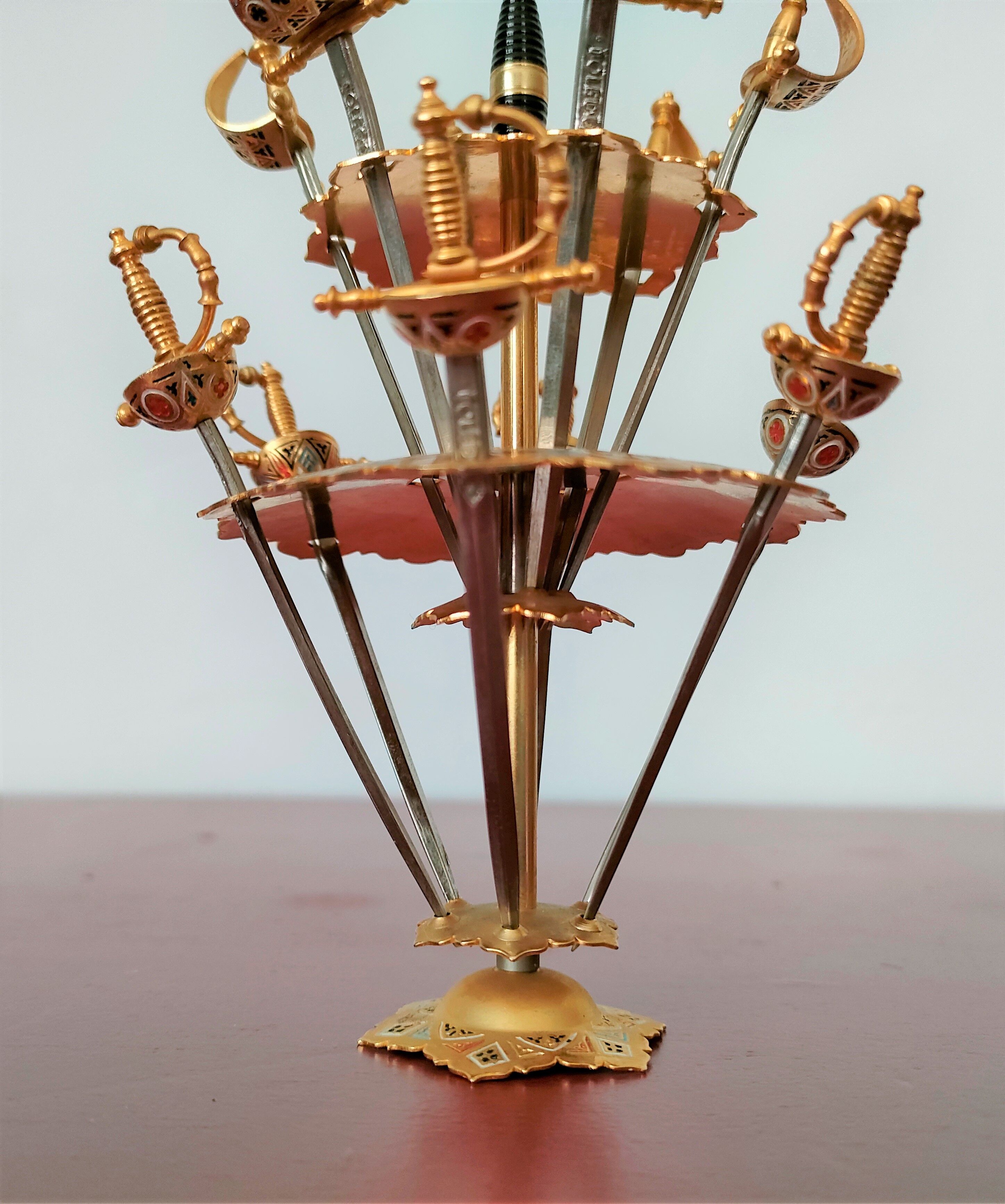 12 aperitif spades in the shape of swords on tray by Toledo Spain 70's