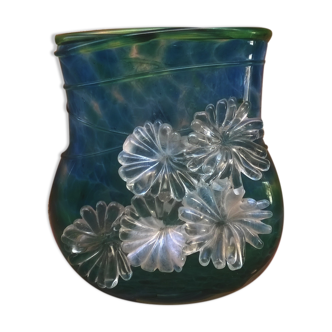 Vase has flower decoration