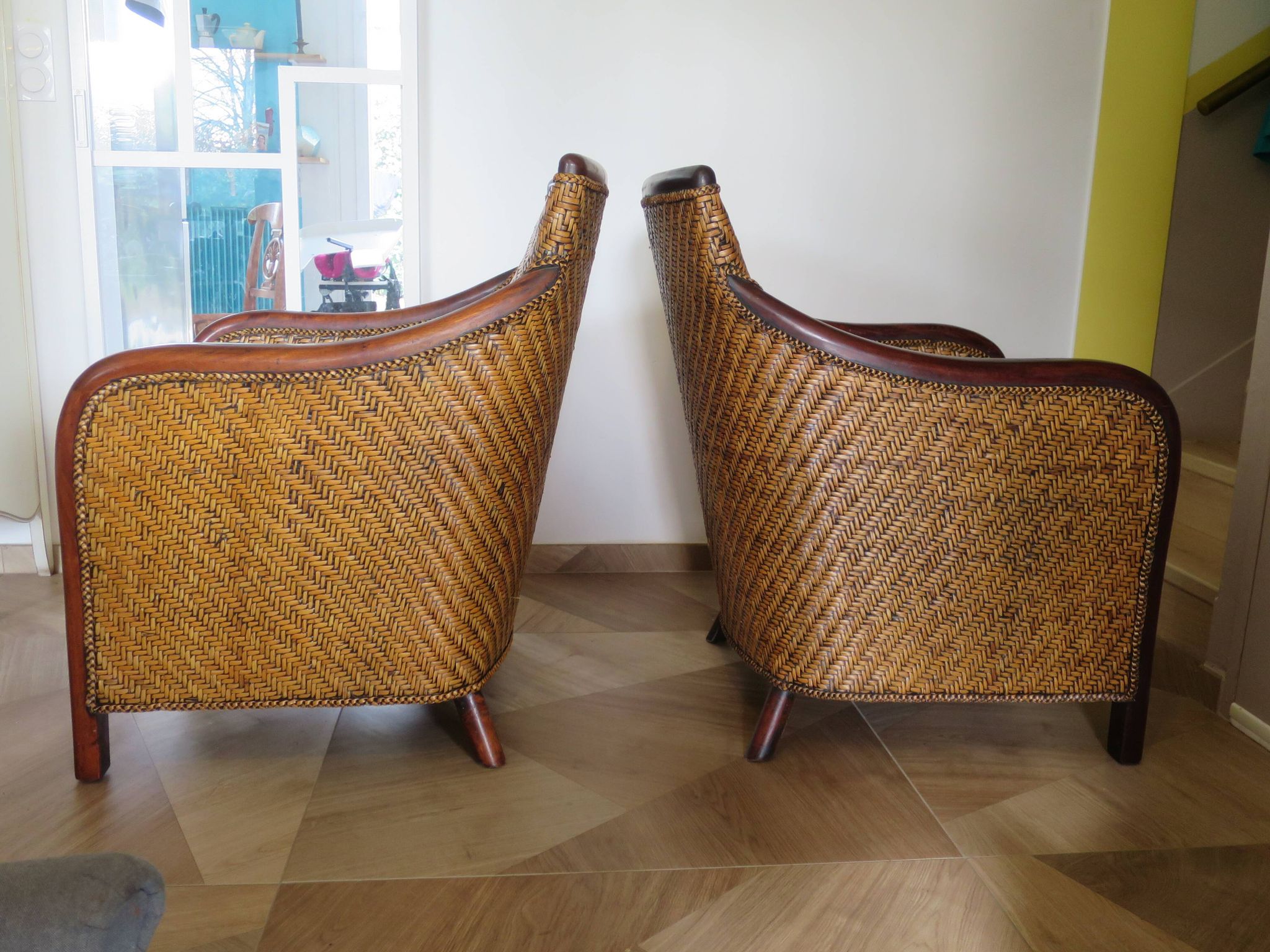 Set of 2 armchairs in woven rattan and exotic wood, 1980s