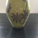 Large green vase with floral decoration