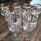 Set of 9 water or red wine glasses in crystal curled and gilded edging