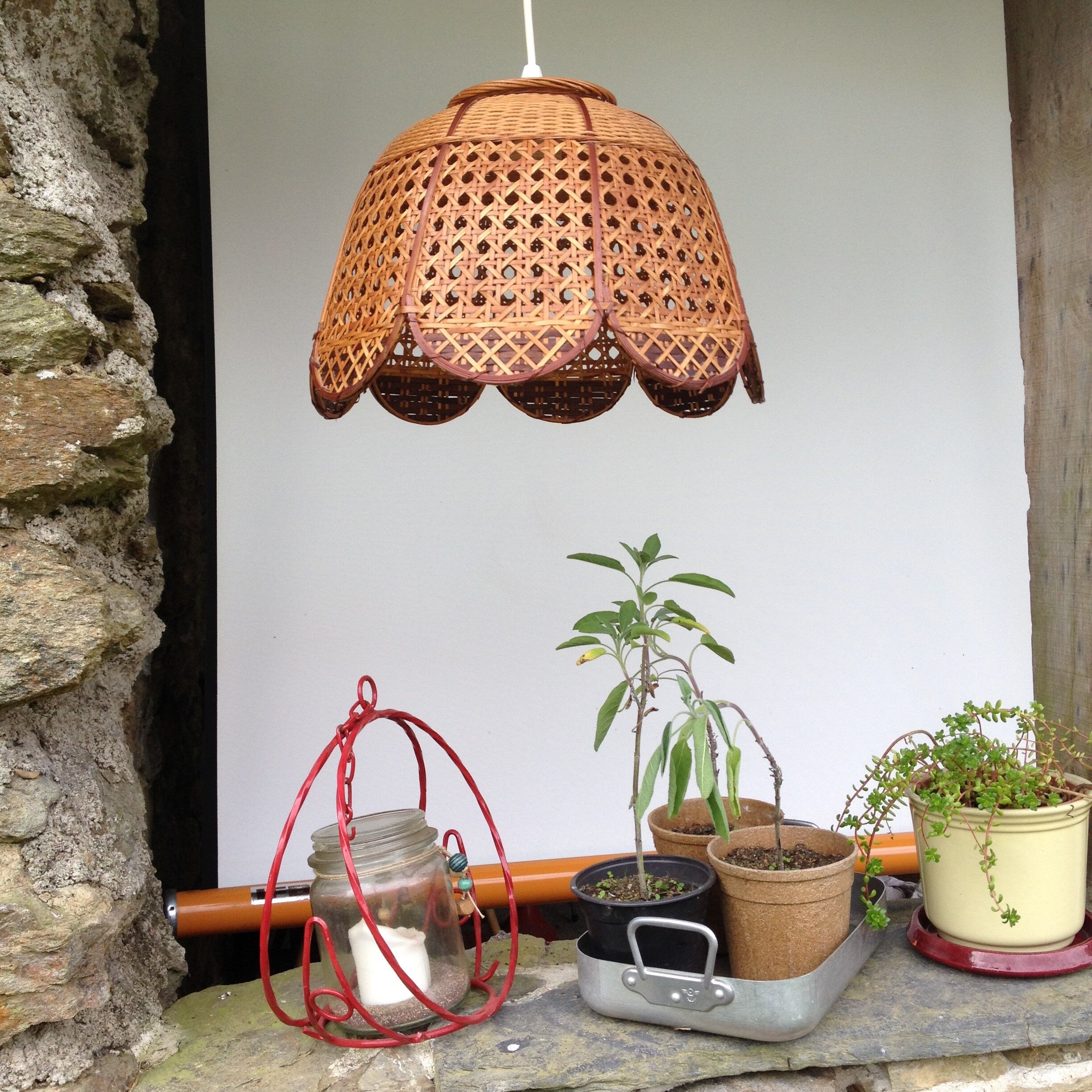 Cane and braided rattan hanging lamp