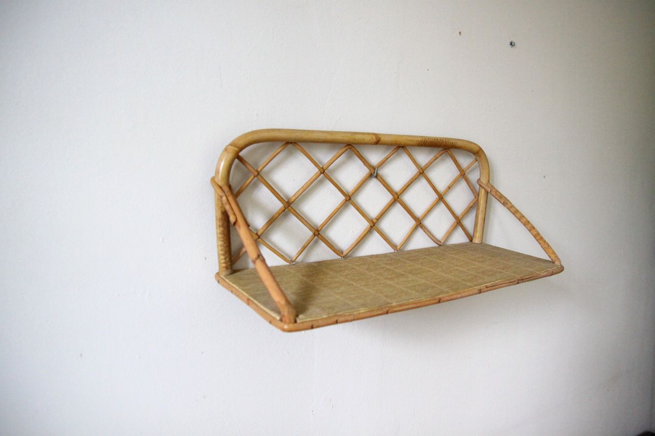Rattan wall shelf