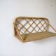 Rattan wall shelf