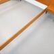 Double bed in vintage Scandinavian style from the 1960s with bedside tables.
