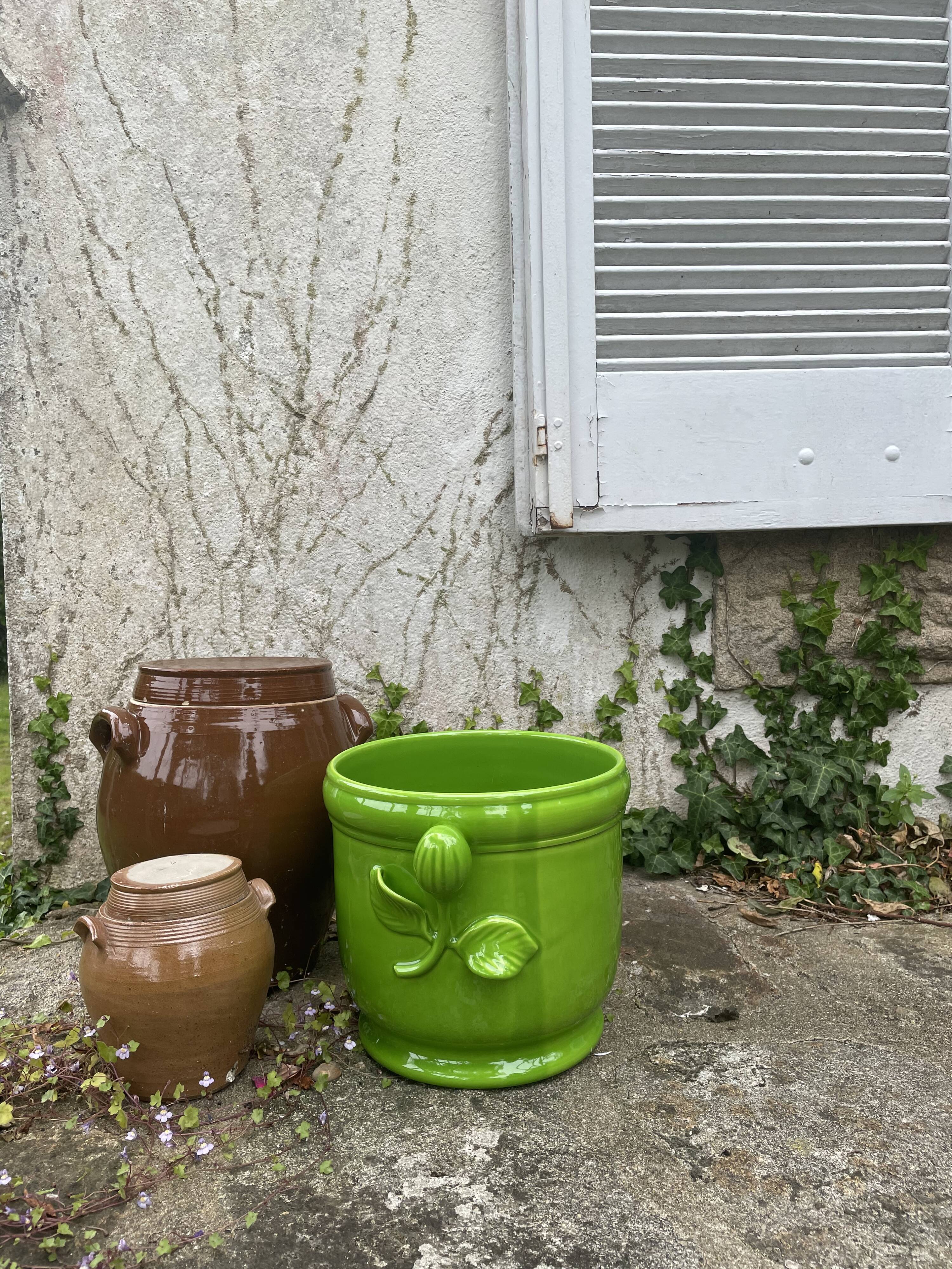 Glazed green pot cover in the style of Moreau Bourg earthenware
