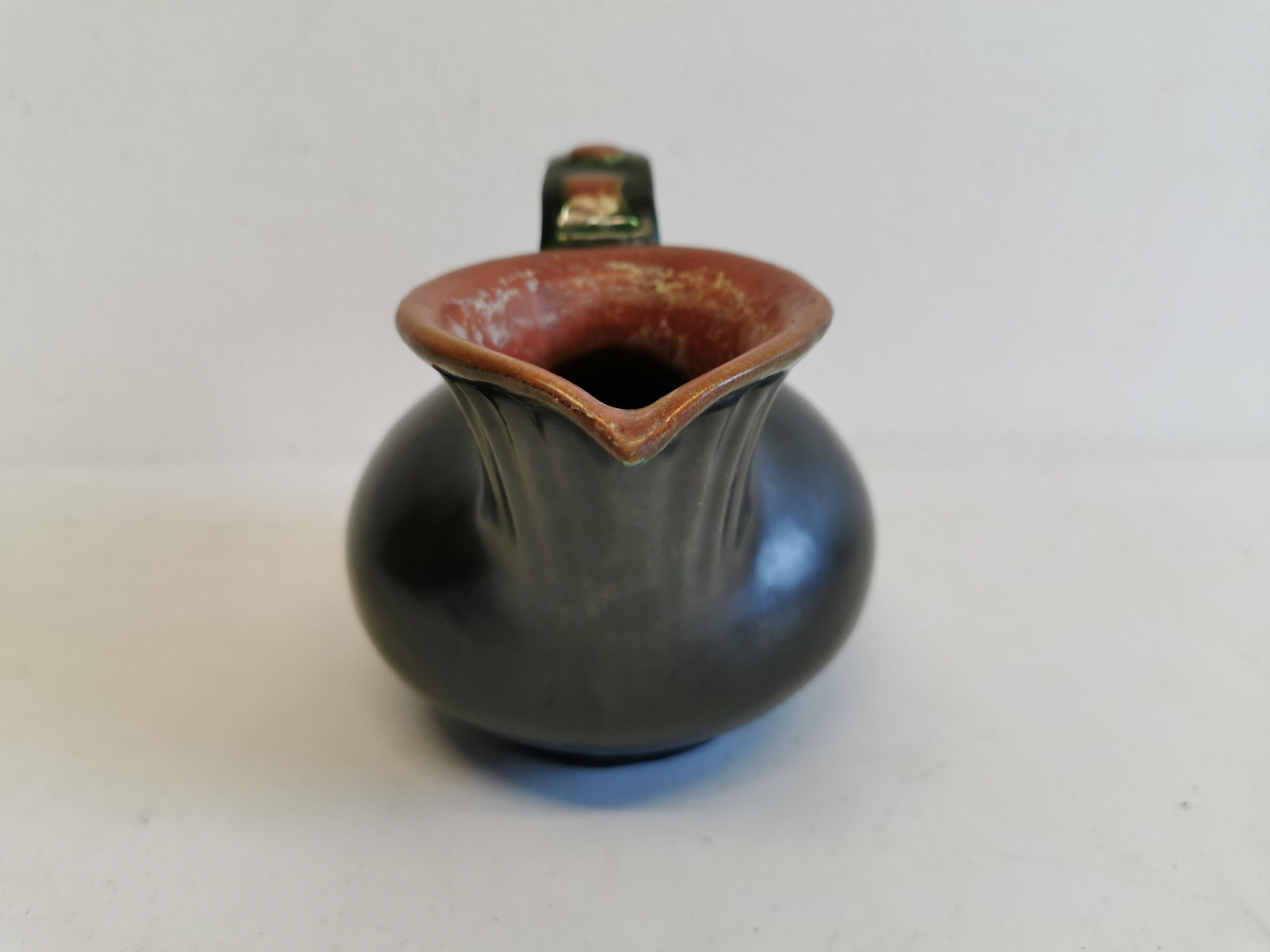 Keramic jug in metal glaze, from Danish Michael Andersen (Stamped with the 3 fish at the bottom)