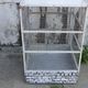 Vintage bird cage, made of wood and chicken wire metal square mesh
