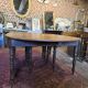 12-foot round oak table with 7 extensions / 20 people